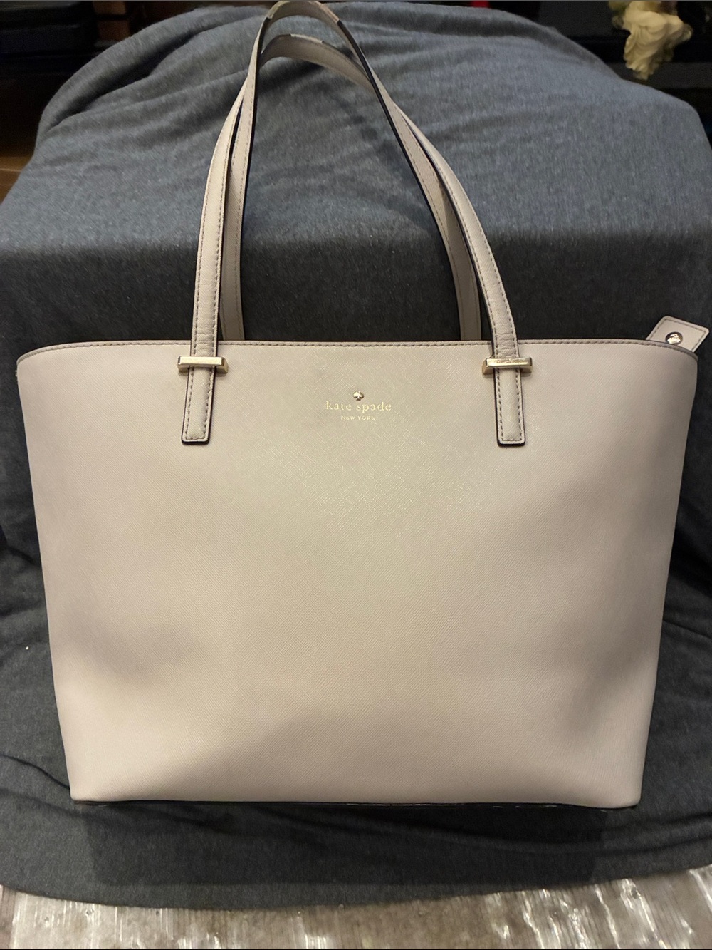 kate spade blush pink tote with gold logo call out peeling on handles